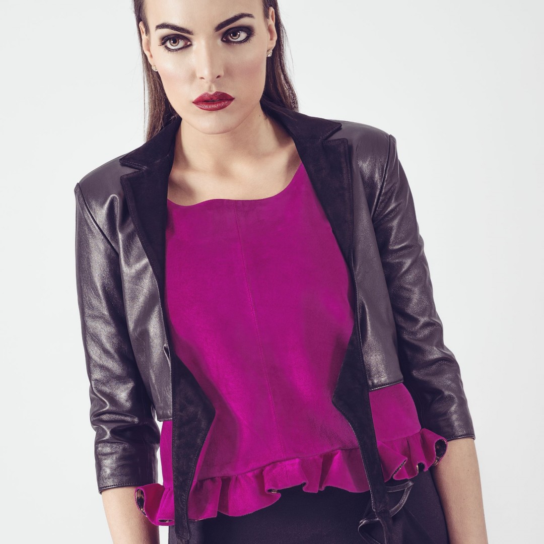 magenta peplum top worn with the black leather jacket
