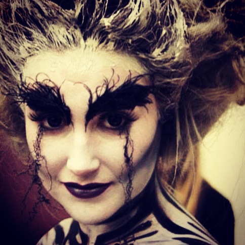 Close up of facial makeup, created using Illamasqua products.  Eyebrows created using antique ostrich feathers.   <br />
Wig dressed with my model's hair using Fuller's Earth. <br />
Model -  Victoria Wilkinson